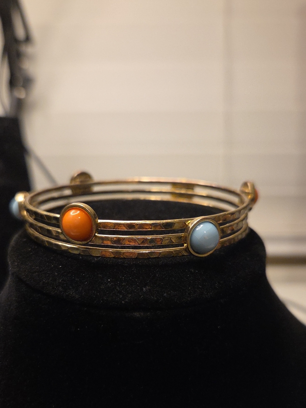 Gold Tone Triple-Band Bracelet with Orange and Light Blue Cabochons